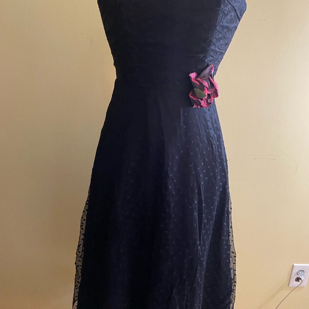 Black dot strapless dress.